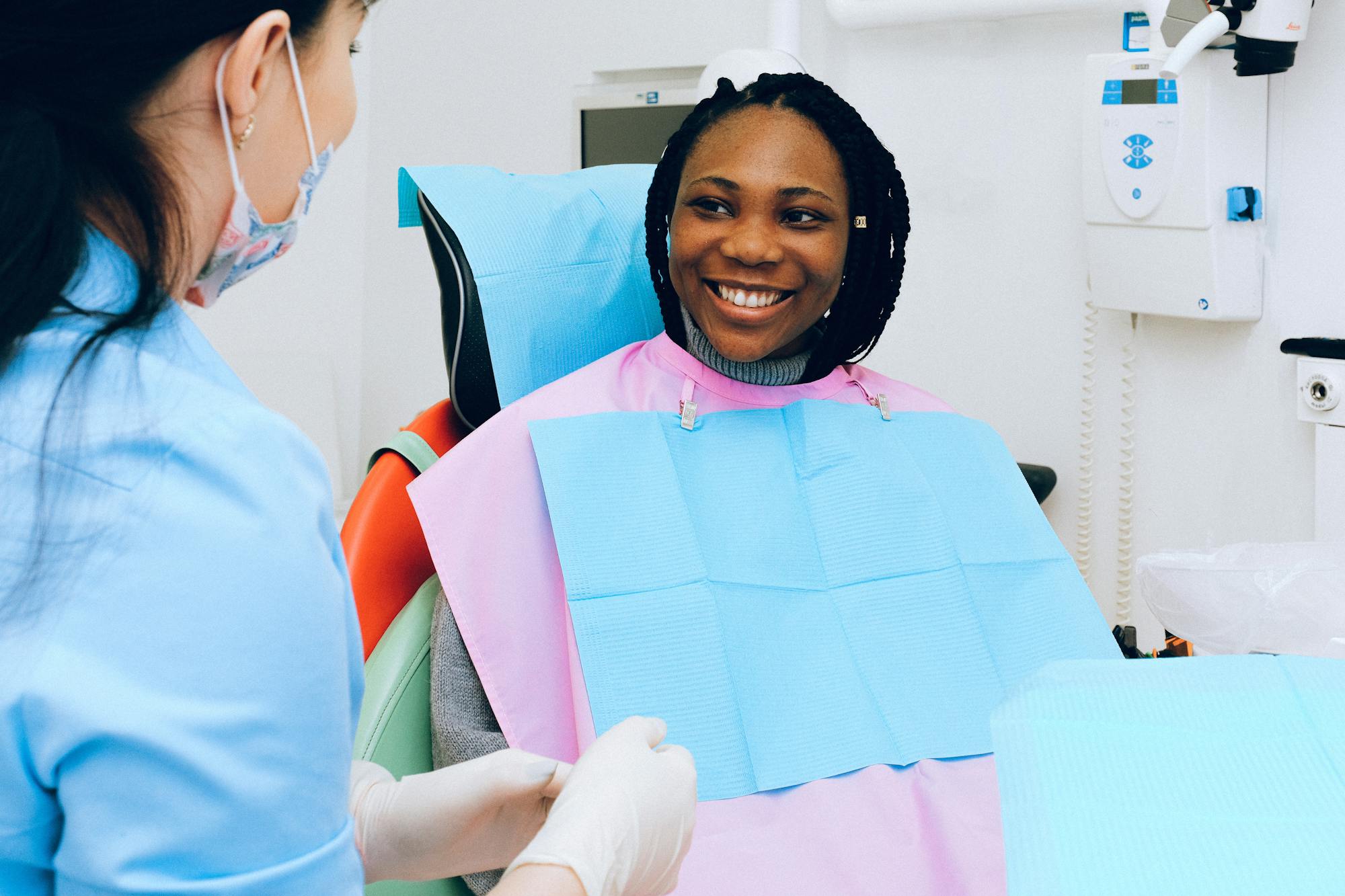 Female dental team providing care