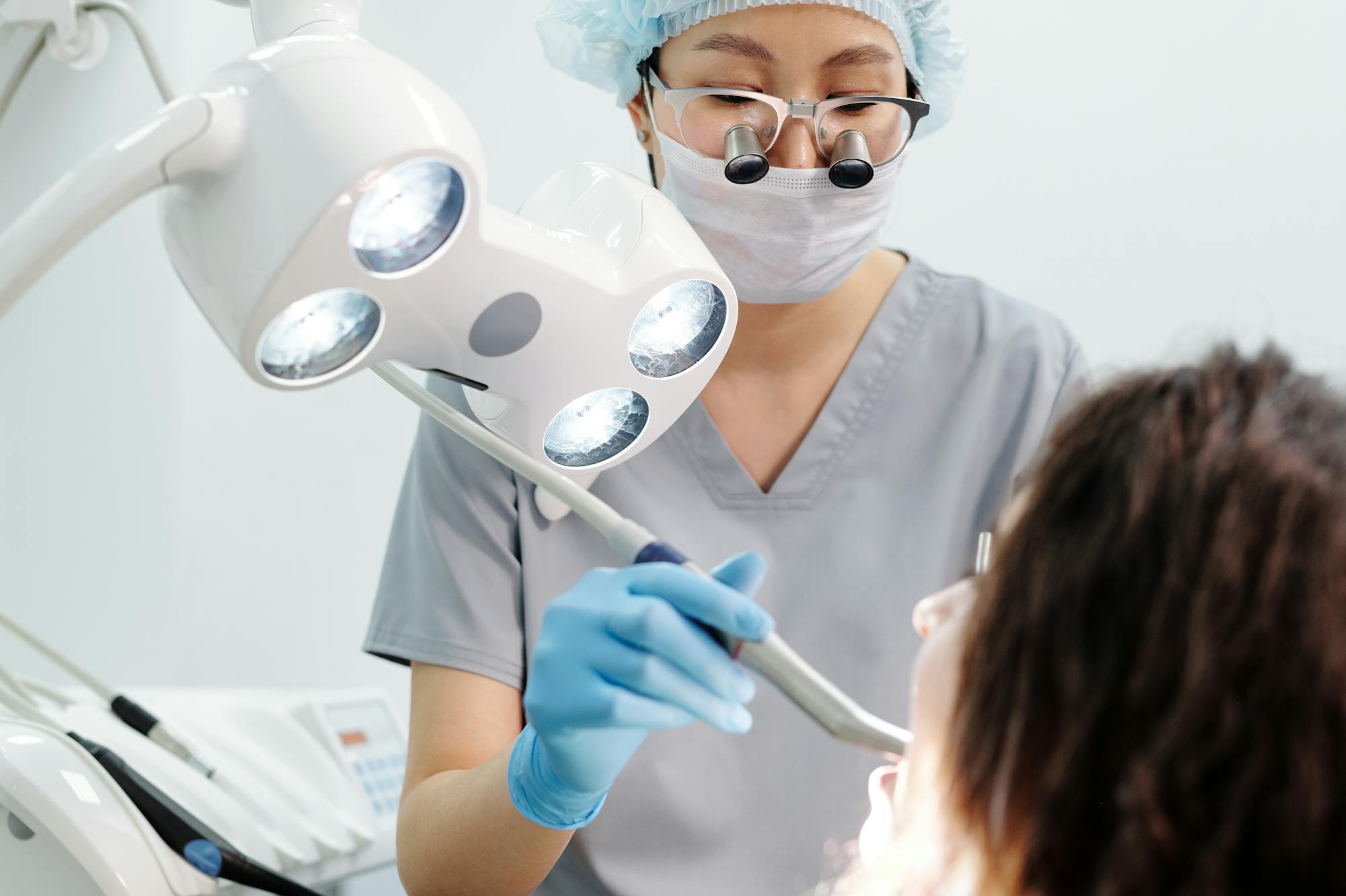 Female dentist smiling with patient